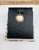 pendentif coran forme rond or 750 millième (18 ct) 2,32g