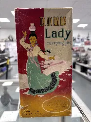 poupee lady carrying jug