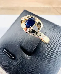 bagie or rubans croisés centrée d'un saphir or 750 millième (18 ct) 1,46g