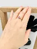 bague 2 ors centrée d'un rubis et 2 petits diamants or 750 millième (18 ct) 1,55g