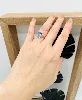 bague argent topaze bleue épaulée de 2 lignes d'oxydes argent 925 millième (22 ct) 2,52g