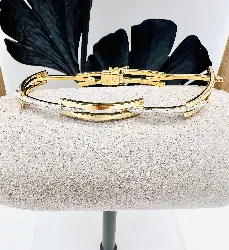 bracelet articulé en 2 ors or 750 millième (18 ct) 11,27g