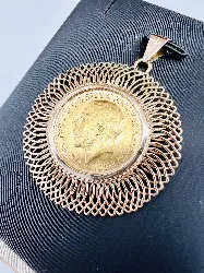 pendentif or serti d'une pièce d'or souverain georges v 1918 or 750 millième (18 ct) 15,09g