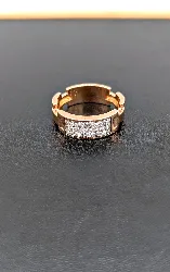 bague en or rose centrée d'une pavage de diamants d'environ 0,54cts au total or 750 millième (18 ct) 8,42g