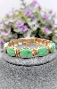 bracelet articulé en or orné de 5 jades ovales en cabochon or 585 millième (14 ct) 21,15g