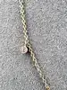 collier dpt fin argent doré et 3 oxydes de zirconium serti clos argent 925 millième (22 ct) 1,95g