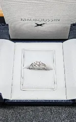 bague mauboussin chance of love n°1 en or blanc centrée d'un diamant d'environ 0,10ct or 750 millième (18 ct) 3,87g