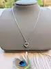 chopard collier happy damonds coeur en or blanc orné de 3 diamants or 750 millième (18 ct) 7,85g
