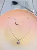 chopard collier happy damonds coeur en or blanc orné de 3 diamants or 750 millième (18 ct) 7,85g