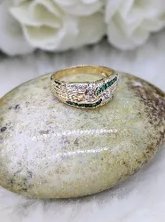 bague bandeau avec des lignes de diamants et d'émeraudes croisées or 750 millième (18 ct) 3,56g