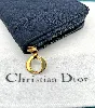 christian dior portefeuille cannage multipochette zippé en tissu bleu marine