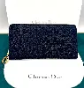 christian dior portefeuille cannage multipochette zippé en tissu bleu marine