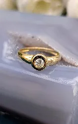 bague solitaire en or sertie d'un diamant d'environ 0,20ct or 750 millième (18 ct) 2,13g