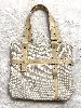 petit sac lancel porté main en toile beige