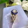 bague fleurs pierre bleue et oxydes