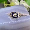bague fleurs pierre bleue et oxydes