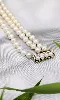 bracelet or 3 rangs de perles de culture blanches or 750 millième (18 ct) 23,64g
