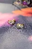 boucles d'oreilles motifs ajourés en 2 ors chacune ornée d'un petit diamant or 750 millième (18 ct) 2,51g