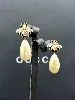 boucles d'oreilles pendantes gucci en métal or vieilli logo gg motif abeill et perle synthétique en forme goutte d'eau style baroq