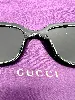 lunettes de soleil gucci gg1535s logo gg doré avec des verres noirs