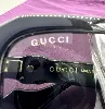 lunettes de soleil gucci gg1535s logo gg doré avec des verres noirs