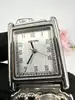 montre harpo paris en argent massif et turquoises mouvement quartz avec cadran rectangulaire et bracelet extensible en acier inoxy