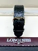 montre longines dolcevita l5 656.4 boitier rectangulaire en acier, 3.2 x 4,2 cm, fond noir, chiffres romains avec le braclet rappo