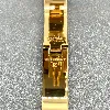 bracelet hermès clic h en métal doré et émail blanc
