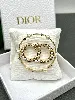 broche dior clair d lune en métal finition dorée, perles en résine blanche et cristaux blancs