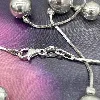 collier maille serpent orné de boules de tailles dégradées argent 925 millième (22 ct) 11,57g