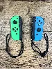 nintendo switch paire de manettes joy-con gauche verte/droite bleue