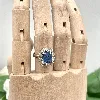 bague christian dior en acier avec cristaux bleus et oxydes