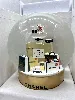 boule a neige chanel sur socle doré à décor d'un flacon de parfum n°5