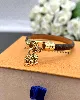 bracelet louis vuitton en toile monogramcuir à charm alma en métal doré