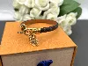 bracelet louis vuitton en toile monogramcuir à charm alma en métal doré