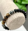 bracpi bracelet élastiqué en pierre oeil de tigre,onyx et acier d8 mm