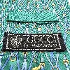 cravate gucci fond vert à motifs équestre