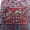 cravate hermès 100% soie à motifs h bordeaux et bleus alternés