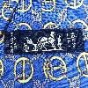 cravate hermès 100% soie fond bleu à motif fantaisie