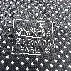 cravate hermès 100% soie noire à petits rectangles blancs alignés