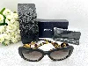 lunettes de soleil prada swirl pr270s avec les verres marron dégraté et les branches branches sculptées