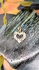 pendentif or forme coeur serti des oxydes or 375 millième (9 ct) 0,79g