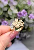 bague ornée de 3 fleurs en 3 ors pavées d'oxydes or 750 millième (18 ct) 3,79g