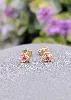 boucles d'oreilles fleur rose chacune centrée d'un rubis or 750 millième (18 ct) 0,46g