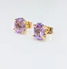 boucles d'oreilles puces en or chacune sertie d'une améthyste ovale facettée or 750 millième (18 ct) 2,25g