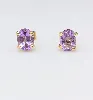 boucles d'oreilles puces en or chacune sertie d'une améthyste ovale facettée or 750 millième (18 ct) 2,25g