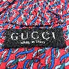 cravate gucci 100 % soie rouge à motifs en spirale bleu marine et bleu clair