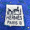 cravate hermès 100% soie fond indigo à motifs de noeuds