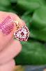pendentif coeur en 2 ors centré d'un rubis et un petit diamant entouré de petits rubis or 750 millième (18 ct) 1,76g