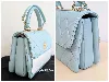 sac à bandoulière trendy cc top handle petit modèle en cuir bleu tiffany